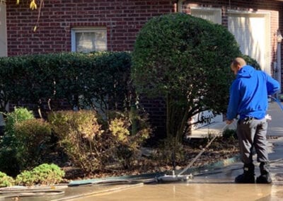 Person cleaning the pathway